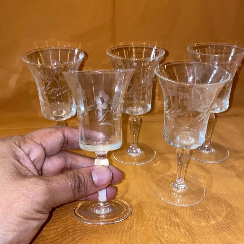 Vintage Set of 4 plus one crystal shot glasses 4 2/3” tall